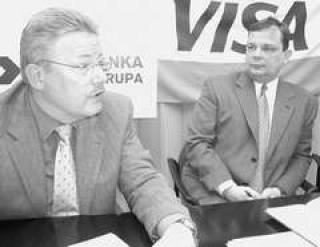  Андреас УНГЕР и зам. председателя правления Pirma banka Андрис ОЗОЛИНЬШ.
