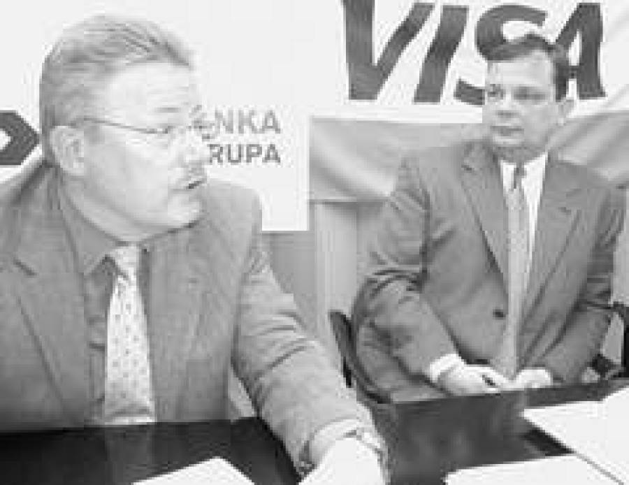  Андреас УНГЕР и зам. председателя правления Pirma banka Андрис ОЗОЛИНЬШ.