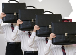 Страна бюрократов: латвийские чиновники прогрызли дыру в госбюджете