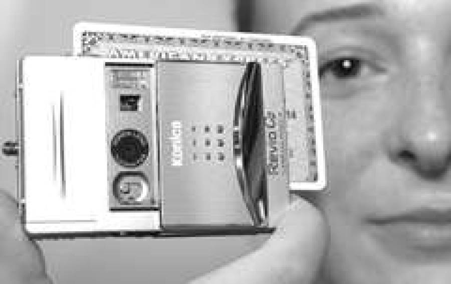 Альянс Кonica и Minolta