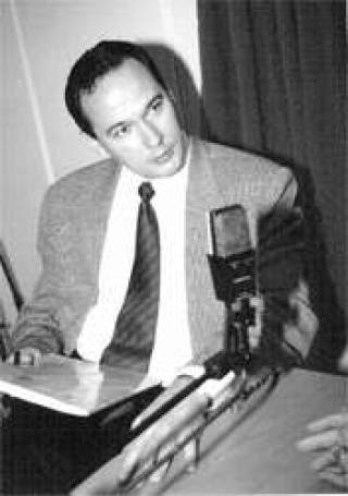 Г-н ЩЕТИНИН за несколько секунд до вручения денег... 