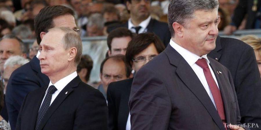 Президент России Владимир Путин (слева) и президент Украины Петр Порошенко (справа).