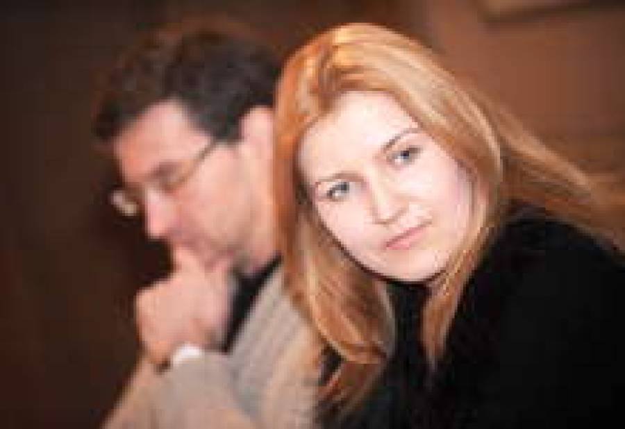 Сопрано Лиене Кинча и дирижер Модестас Питренас.