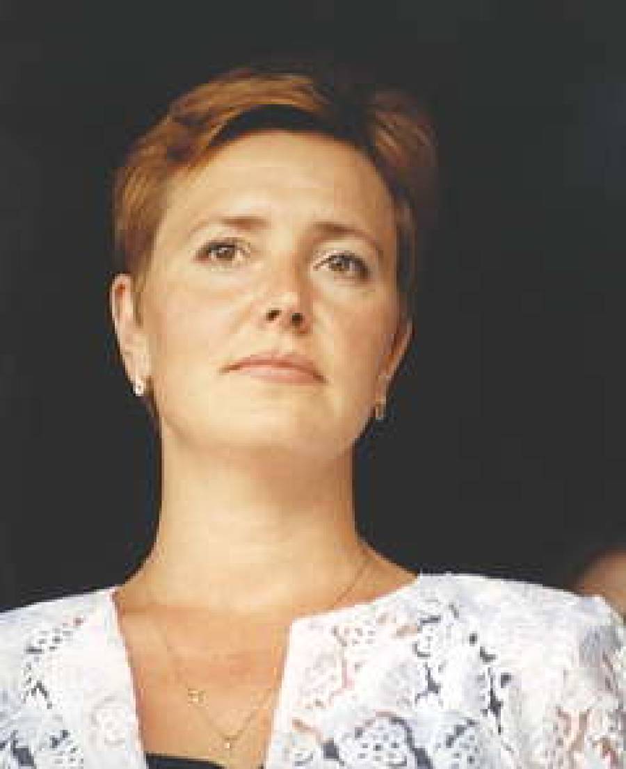  Оксана ЧЕРКАСОВА любит детей и хоровое пение.