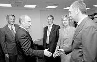 Одобрение Кремля у О.Дерипаски (справа) уже почти в руках.