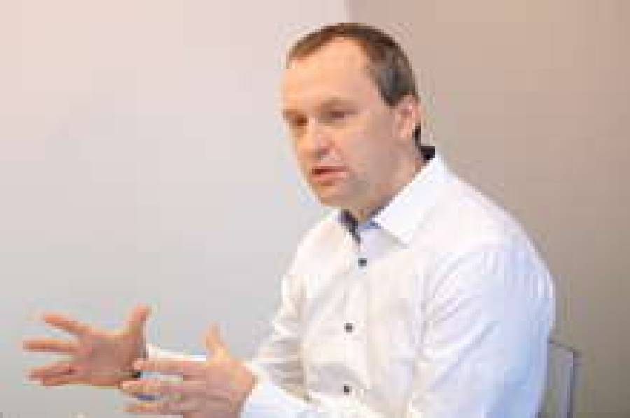 Партнер Ernst &amp; Young Андрис Лауциньш.