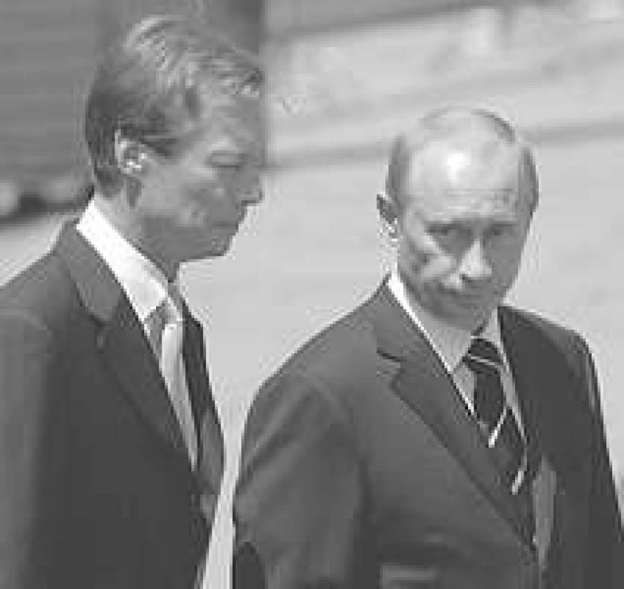 С великим герцогом Анри (слева) в Люксембурге В.Путин говорил о торгово-инвестиционном сотрудничестве.