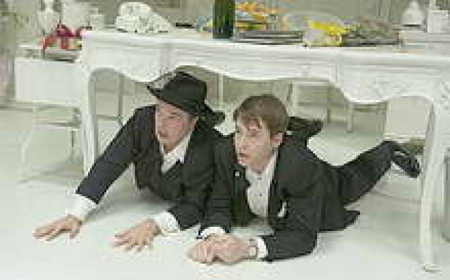 Натан Лейн и Мэттью Бродерик в фильме “Продюсеры” (2005).