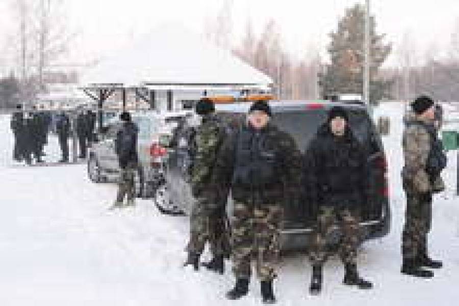 Собрание акционеров Latvijas кuģniecība прошло в микроавтобусе под усиленной охраной.