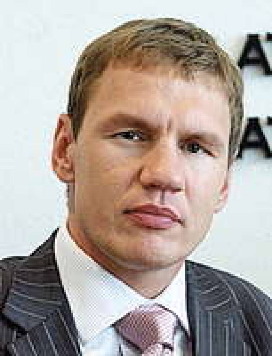 Aндрис Oзoлс.