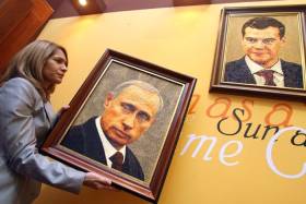 Немцы вешают в офисах портреты Путина